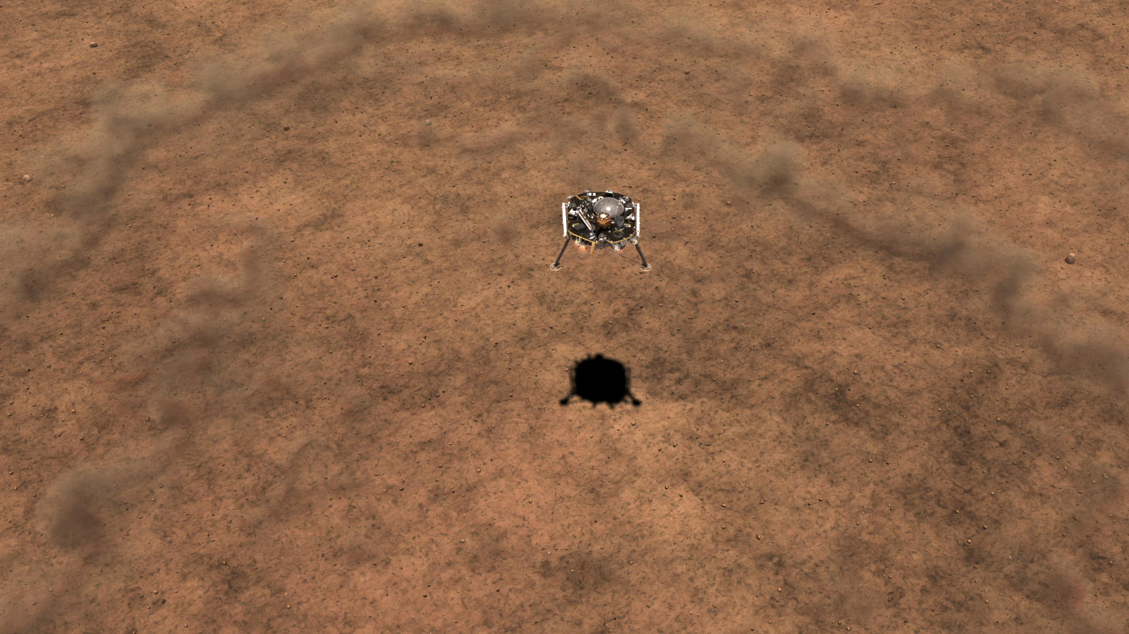 This illustration shows a simulated view of NASA's InSight lander kicking up dust as it lands on the Martian surface.