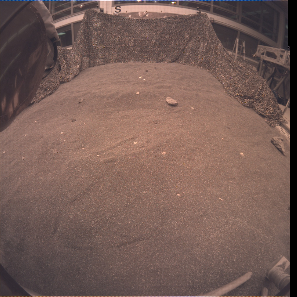 This is an image taken by an engineering model of NASA’s InSight lander during a rehearsal for instrument deployment in a Mars-like testbed at NASA’s Jet Propulsion Laboratory, Pasadena, California.
