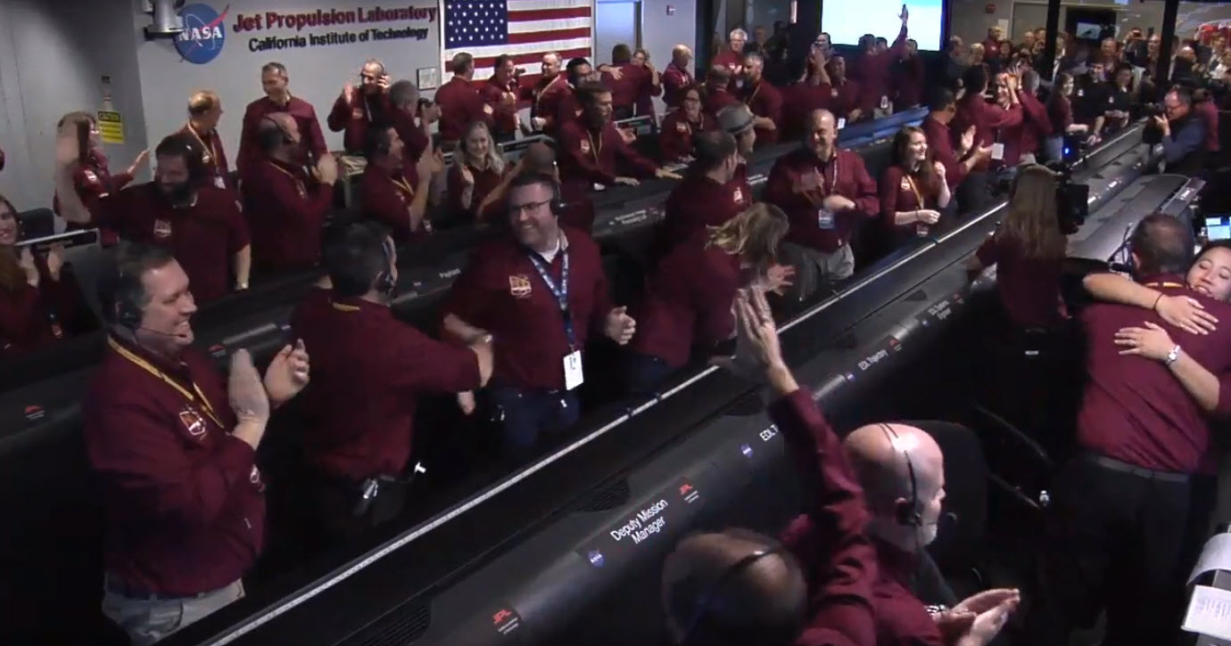 The NASA InSight team reacts after receiving confirmation that the spacecraft successfully touched down on the surface of Mars, inside the Mission Support Area at NASA's Jet Propulsion Laboratory in Pasadena, California.