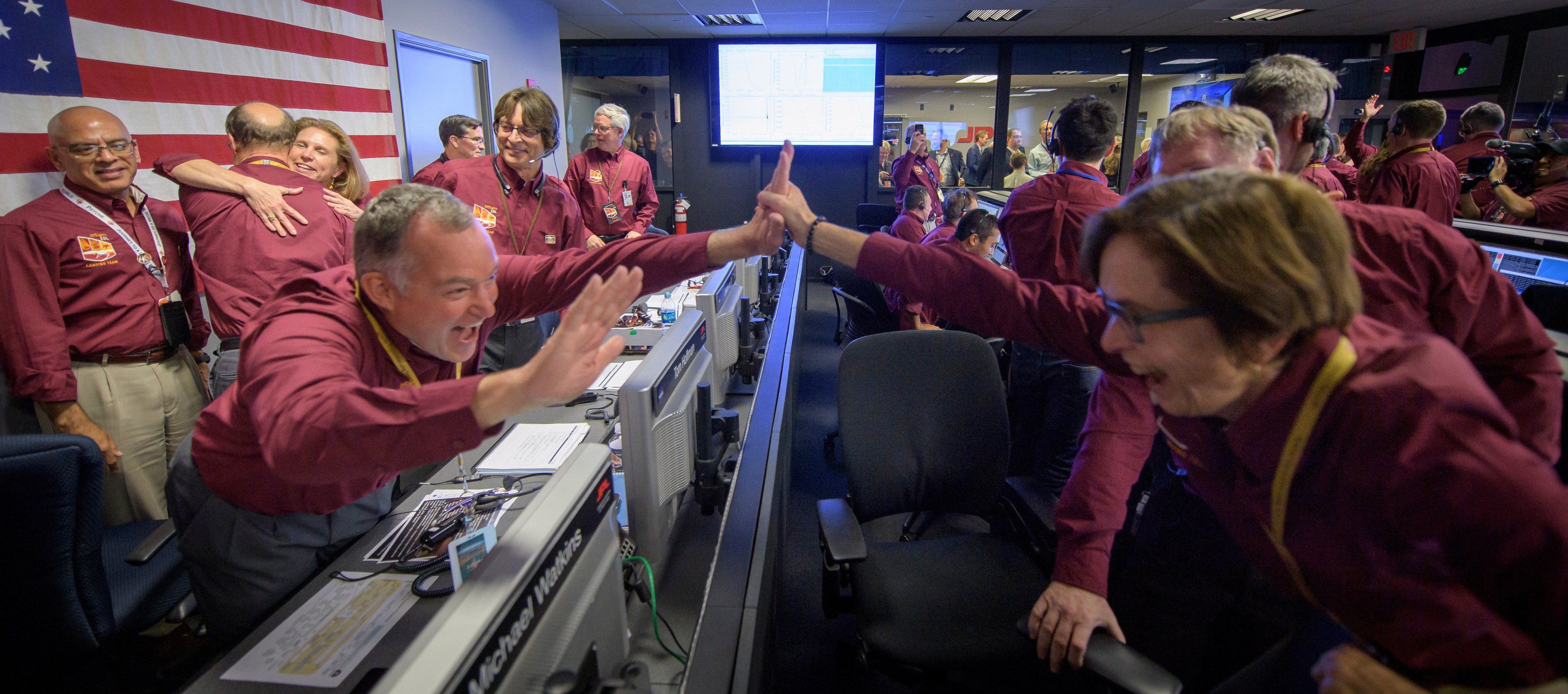 Tom Hoffman, InSight Project Manager, NASA JPL, left, and Sue Smrekar, InSight deputy principal investigator, NASA JPL, react after receiving confirmation that the Mars InSight lander successfully touched down on the surface of Mars, Monday, Nov. 26, 2018 inside the Mission Support Area at NASA's Jet Propulsion Laboratory in Pasadena, California.