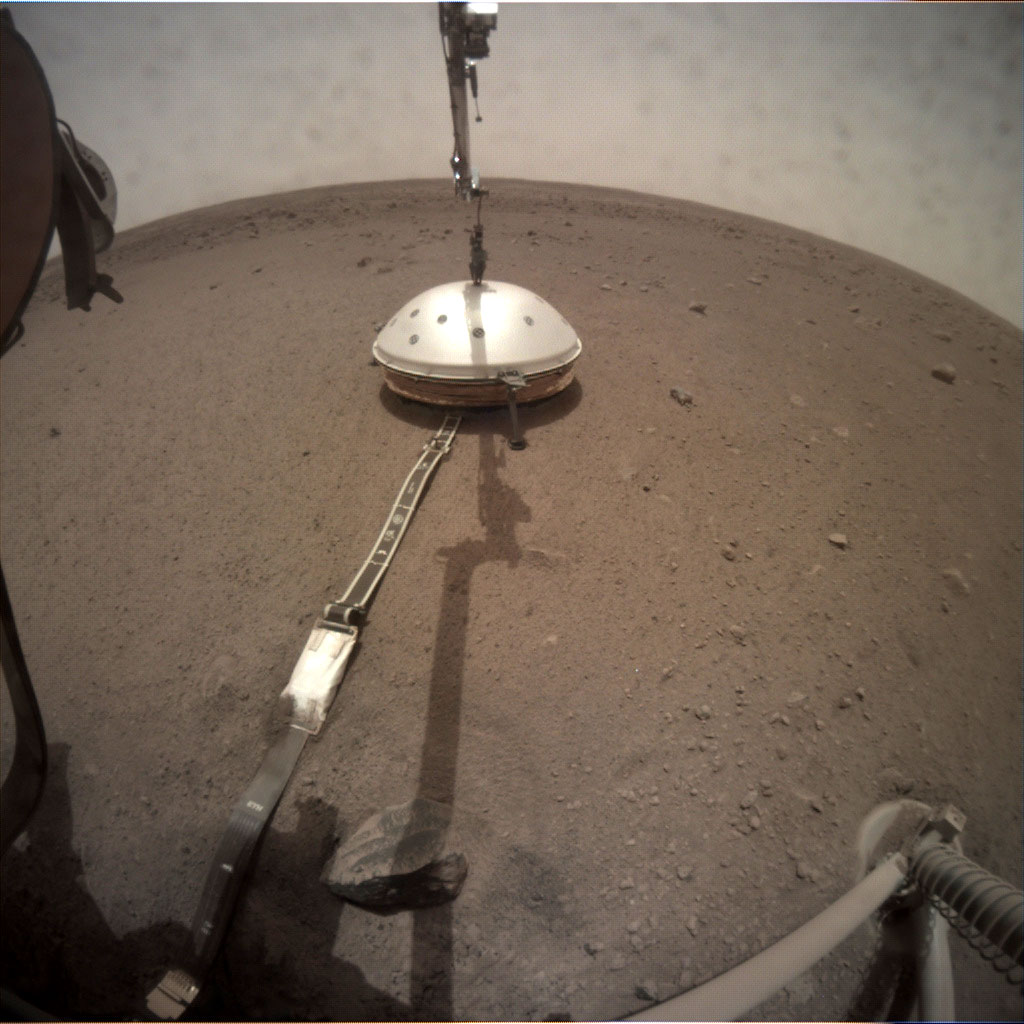 NASA's InSight lander deployed its Wind and Thermal Shield on Feb. 2 (Sol 66). The shield covers InSight's seismometer, which was set down onto the Martian surface on Dec. 19.