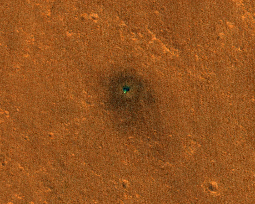 NASA's InSight spacecraft and its recently deployed Wind and Thermal Shield were imaged on Feb. 4 by the HiRISE camera aboard NASA's Mars Reconnaissance Orbiter.