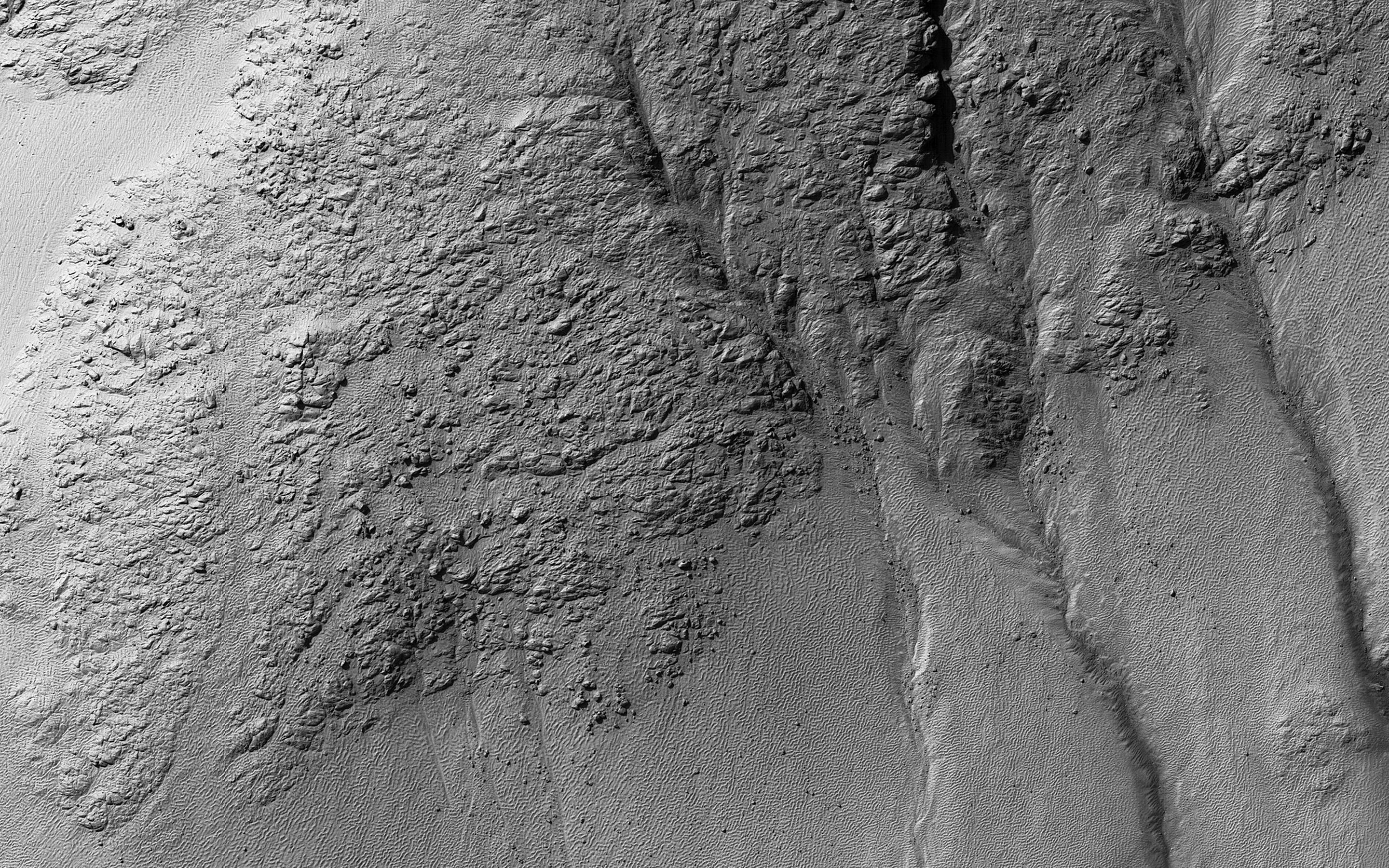 This image acquired on December 26, 2018 by NASAs Mars Reconnaissance Orbiter, shows the hills that resulted from uplifted rocks due to an impact that formed the 230-kilometer diameter Galle Crater.