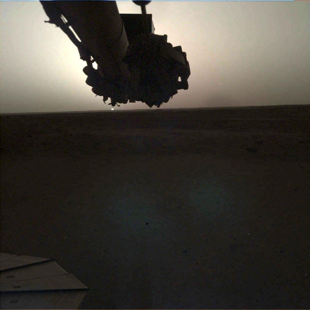 NASA's InSight lander used its Instrument Deployment Camera (IDC) on the spacecraft's robotic arm to image this sunrise on Mars on April 24, 2019, the 145th Martian day (or sol) of the mission. This was taken around 5:30 a.m. Mars local time.