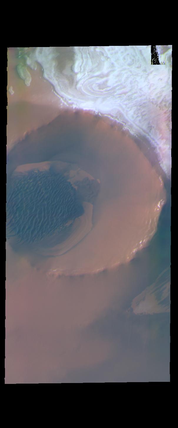 This image from NASAs Mars Odyssey shows Inuvik Crater, located near the north polar cap.