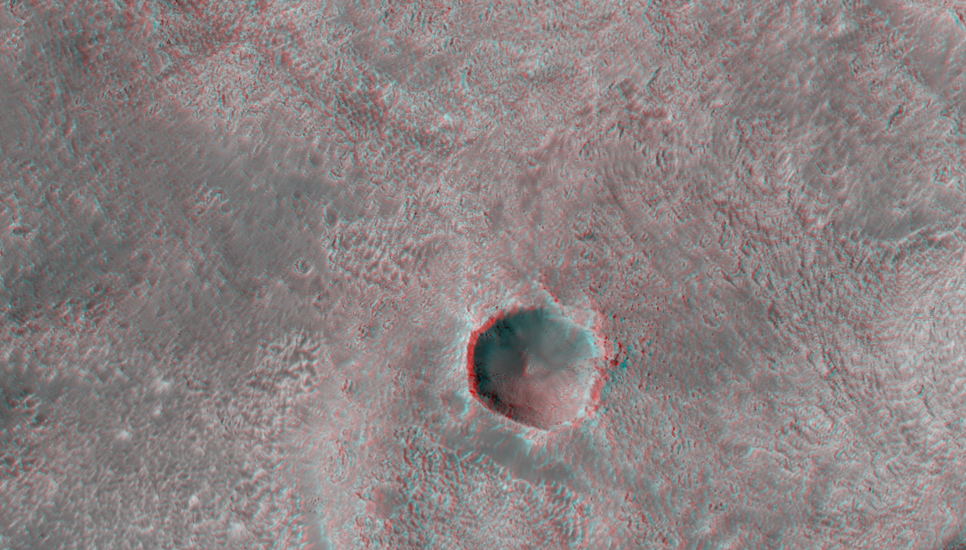 This DLE [double layer ejecta] crater formed at the edge of an older/pre-existing crater