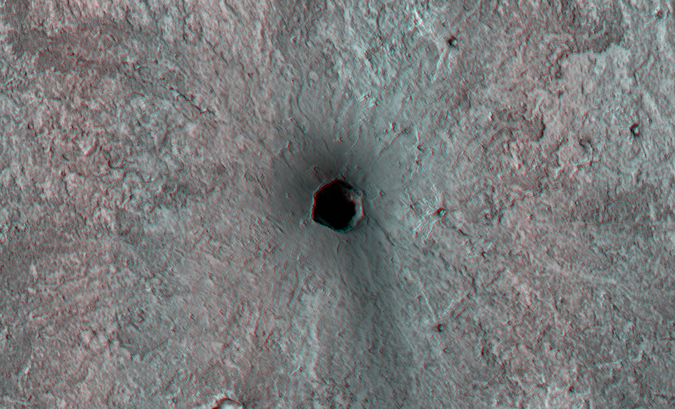 This is a small volcano superposed on the flanks of a larger one of the Cerberus Tholi.