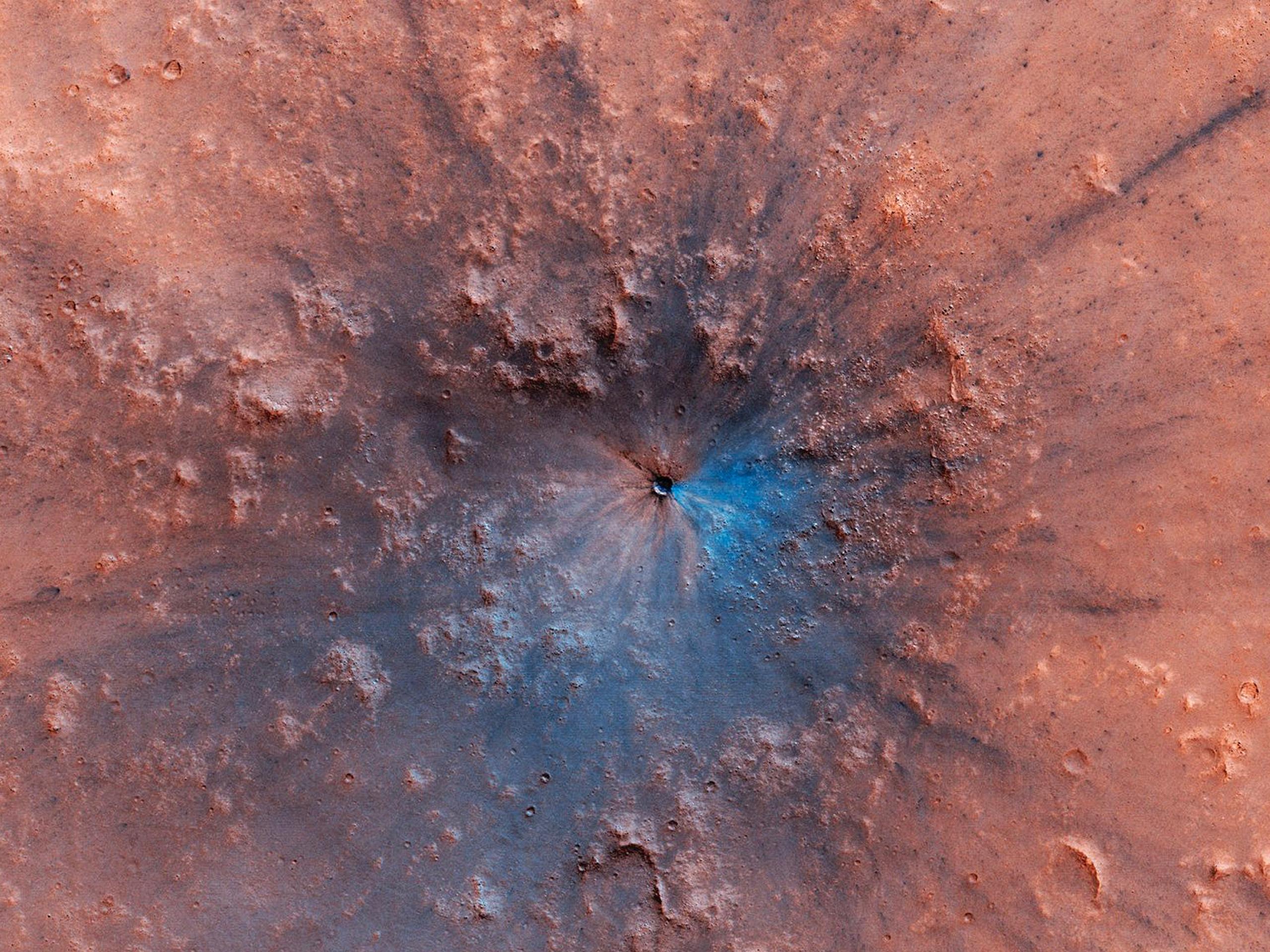 This image, acquired by NASAs Mars Reconnaissance Orbiter, shows a new impact crater that has appeared on the surface of Mars, formed at most between September 2016 and February 2019.