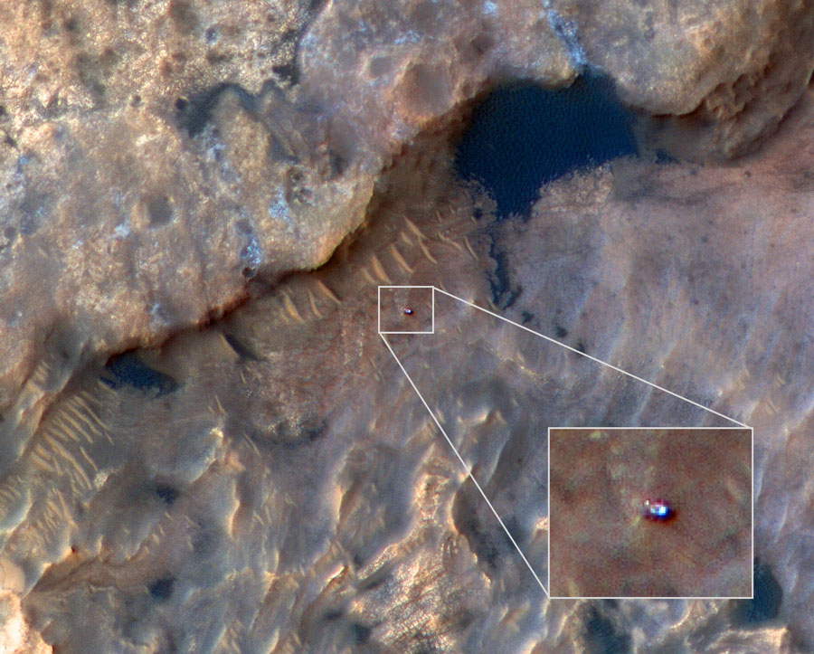 NASA's Curiosity Mars rover can be seen in this image taken from space by the HiRISE camera aboard the Mars Reconnaissance Orbiter.