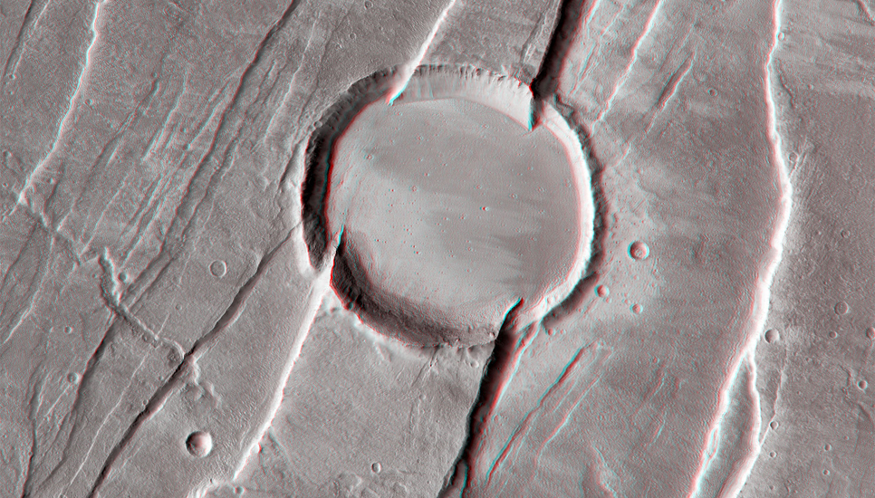 Tantalus Fossae are a set of faults on the eastern flank of Alba Mons, one of the great Tharsis Montes volcanoes.