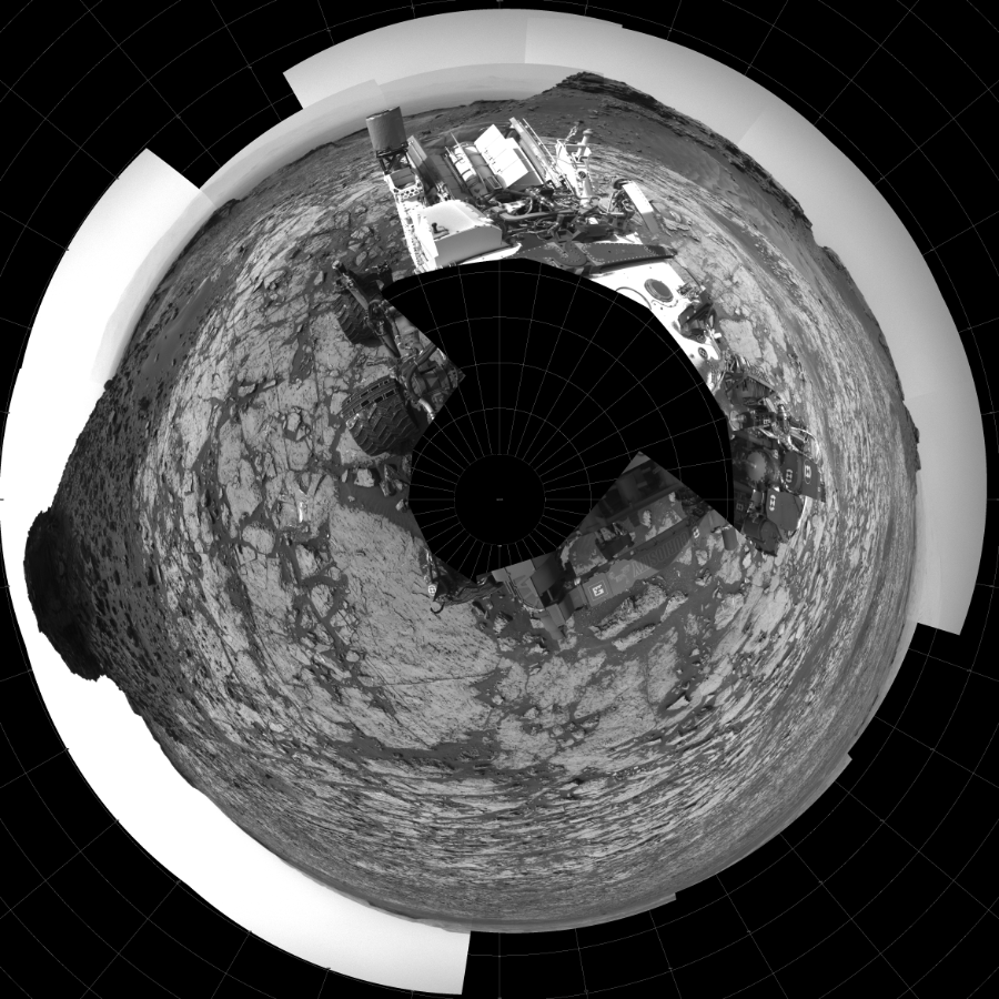 NASA's Mars rover Curiosity took 27 images in Gale Crater using its mast-mounted Left Navigation Camera (Navcam) to create this mosaic. The seam-corrected mosaic provides a polar stereographic projection panorama of the Martian surface with 0 degrees azimuth (measured clockwise from north) at the top of the image. Curiosity took the images on September 06, 2016, Sol 1452 of the Mars Science Laboratory mission at drive 2296, site number 57. The local mean solar time for the image exposures was 2 PM. Each Navcam image has a 45-degree field of view. CREDIT: NASA/JPL-Caltech