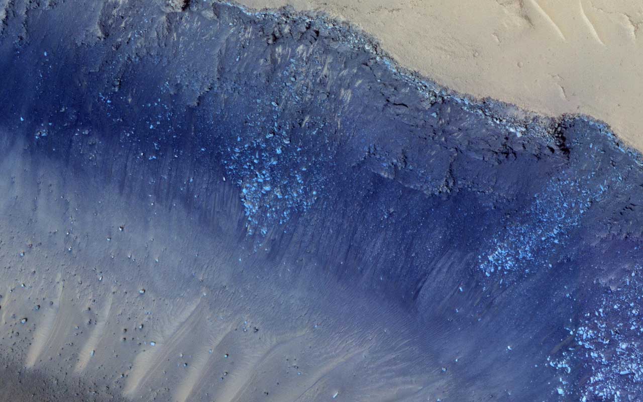 The two largest quakes detected by NASA's InSight appear to have originated in a region of Mars called Cerberus Fossae. Scientists previously spotted signs of tectonic activity here, including landslides. This image was taken by the HiRISE camera on NASA's Mars Reconnaissance Orbiter.