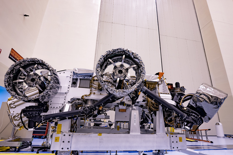 A photo of three of the six flight wheels that will travel to Mars can be seen attached to NASA's Perseverance rover