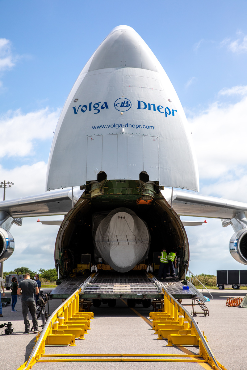 The first stage of the Atlas V that will carry Perseverance rover into space is offloaded from a cargo plane at Kennedy Space Center in Florida