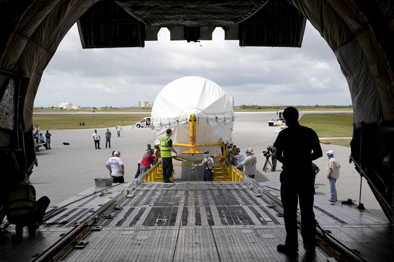 View from inside the Antonov aircraft as the rocket booster for Mars 2020 is offloaded