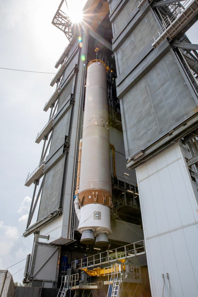 The booster for Mars 2020 is lifted up in the Vertical Integration Facility in Florida