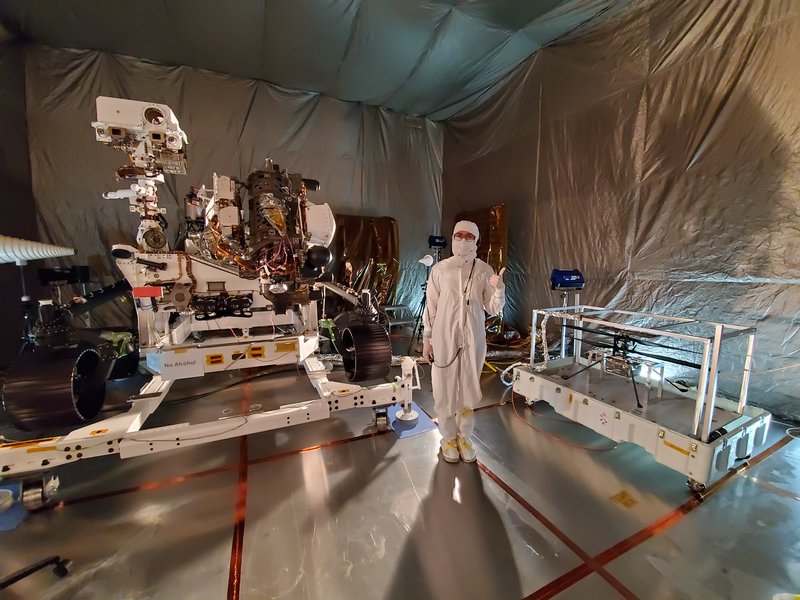 Christina Hernandez during the Mars Perseverance rover testing phase, in an area that includes three instruments she worked on: MEDA, RIMFAX, and PIXL.