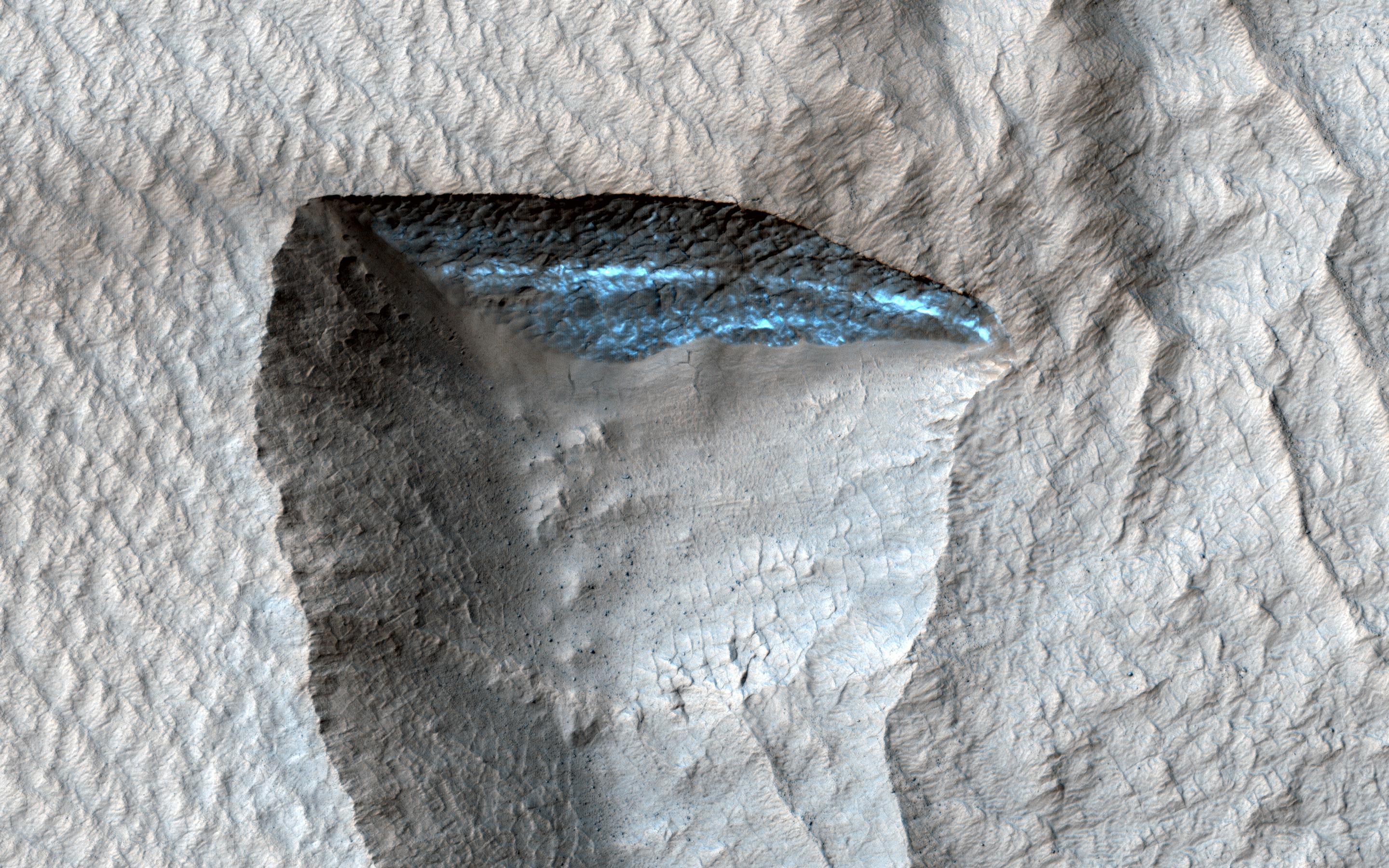 This image acquired on October 7, 2020 by NASAs Mars Reconnaissance Orbiter, shows a deposit draping the surface like a blanket.