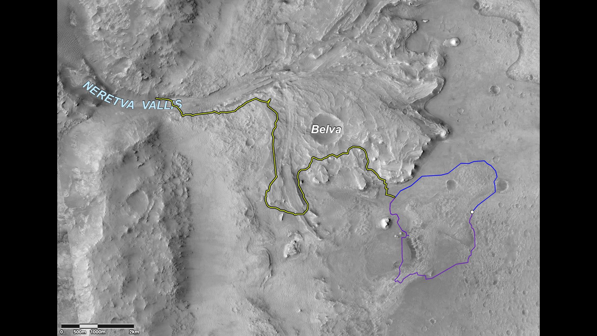 This image shows two possible routes (blue and purple) to the fan-shaped deposit of sediments known as a delta for NASA’s Perseverance rover on Mars. The yellow line marks a notional traverse exploring the Jezero delta.