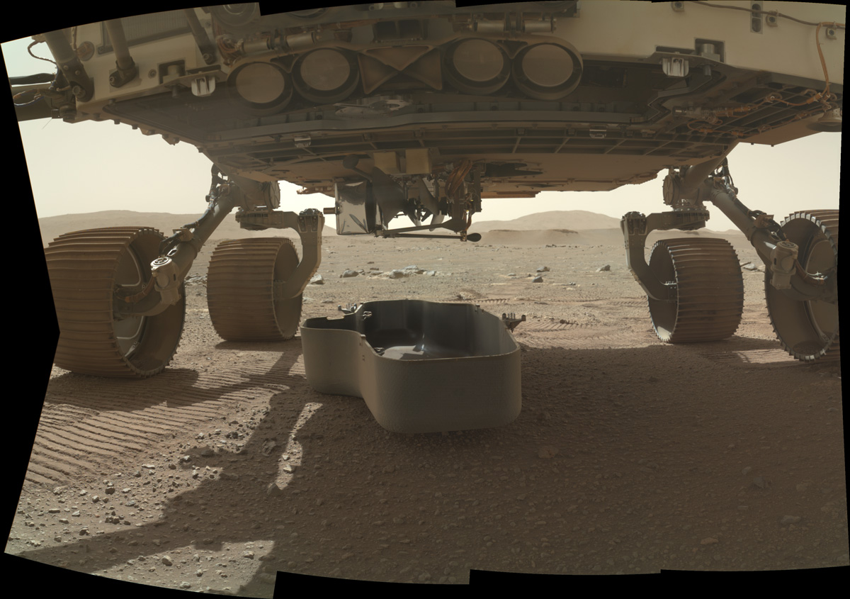 The Ingenuity Helicopter stoved under Perseverance rover on the surface of Mars