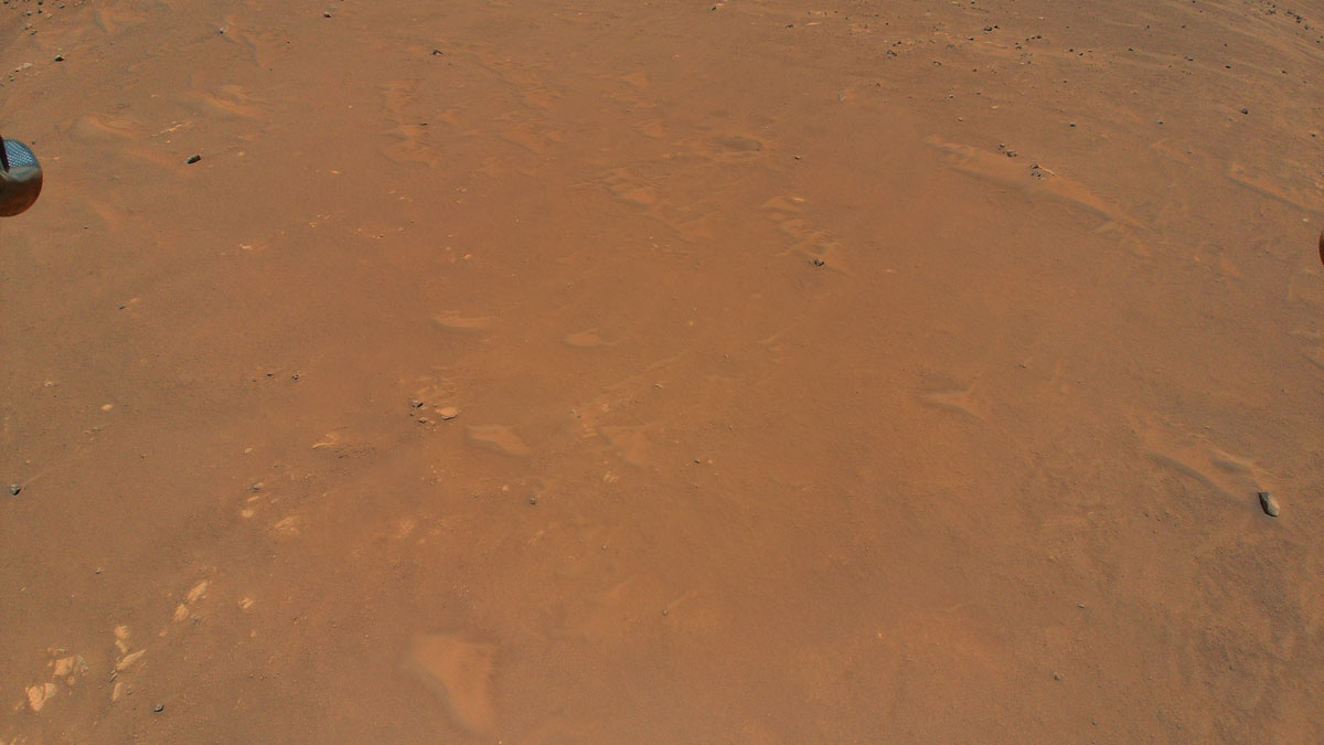 NASA’s Ingenuity Mars Helicopter took this color image from an altitude of 33 feet (10 meters) during its fifth flight on May 7, 2021.
