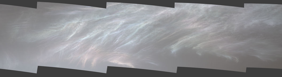NASA’s Curiosity Mars rover spotted these iridescent, or “mother of pearl,” clouds on March 5, 2021, the 3,048th Martian day, or sol, of the mission. Seen here are five frames stitched together from a much wider panorama taken by the rover’s Mast Camera, or Mastcam.