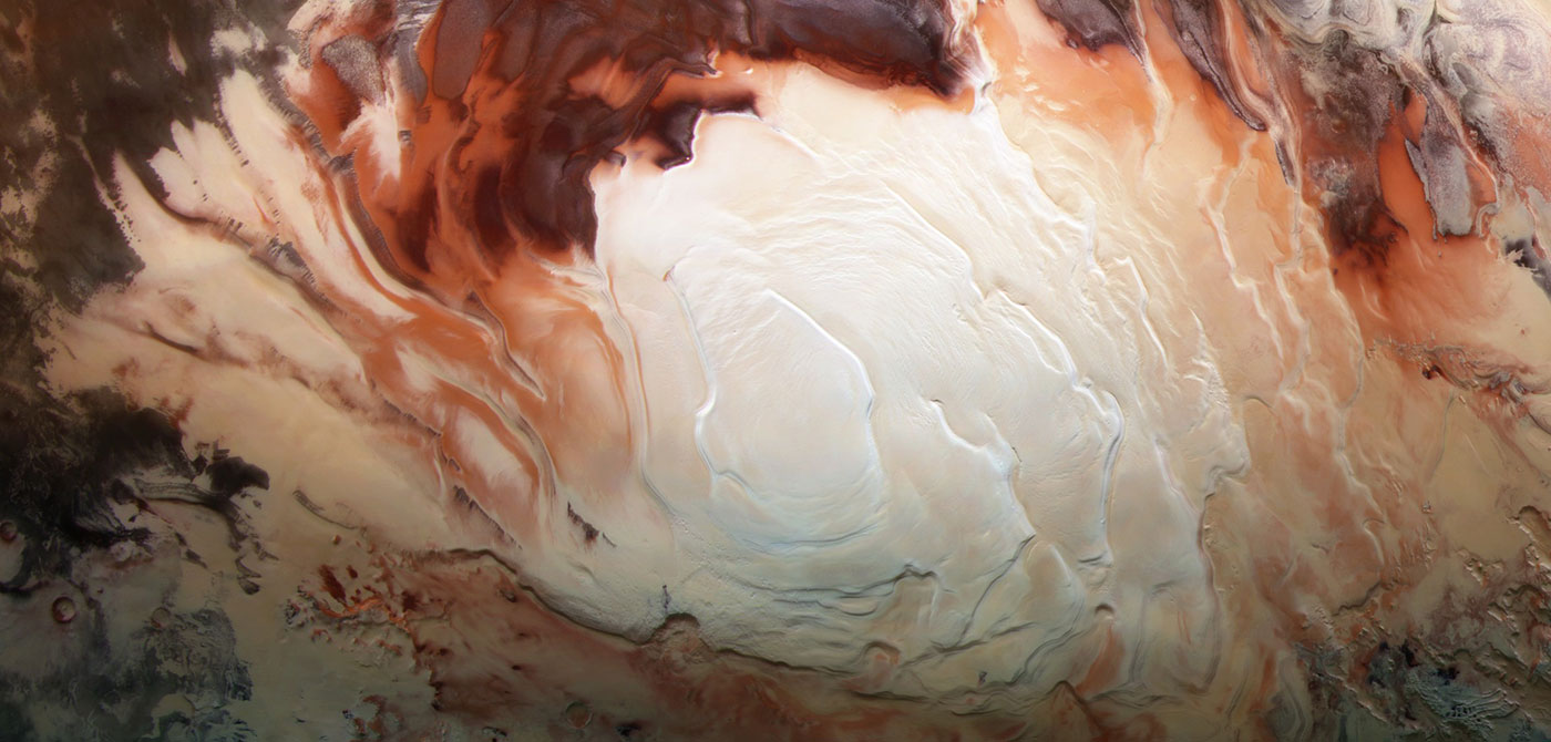Color image whose bright white region shows the icy cap that covers Mars’ south pole, composed of frozen water and frozen carbon dioxide