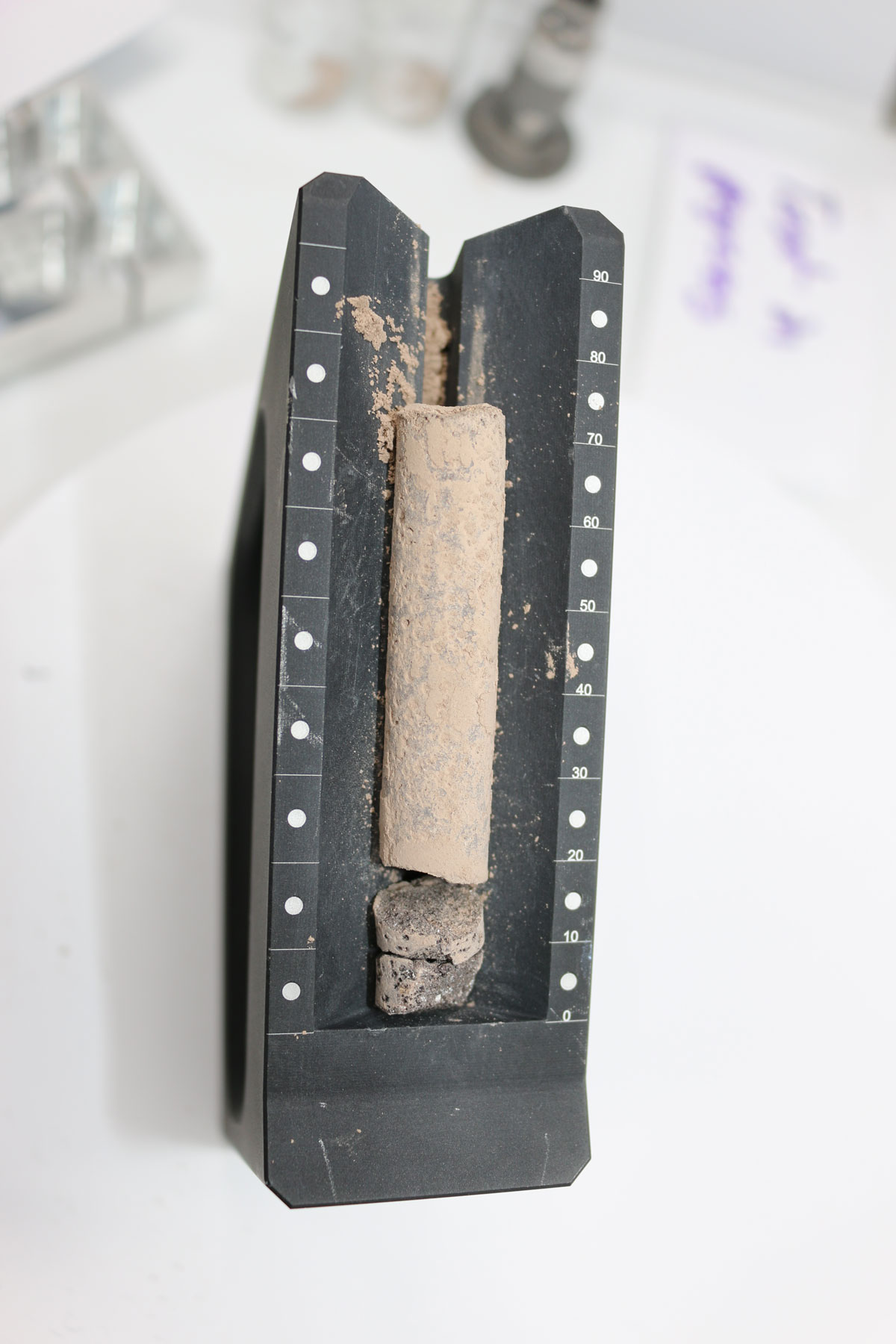 Image of a rock core testing with the Sample Caching system.
