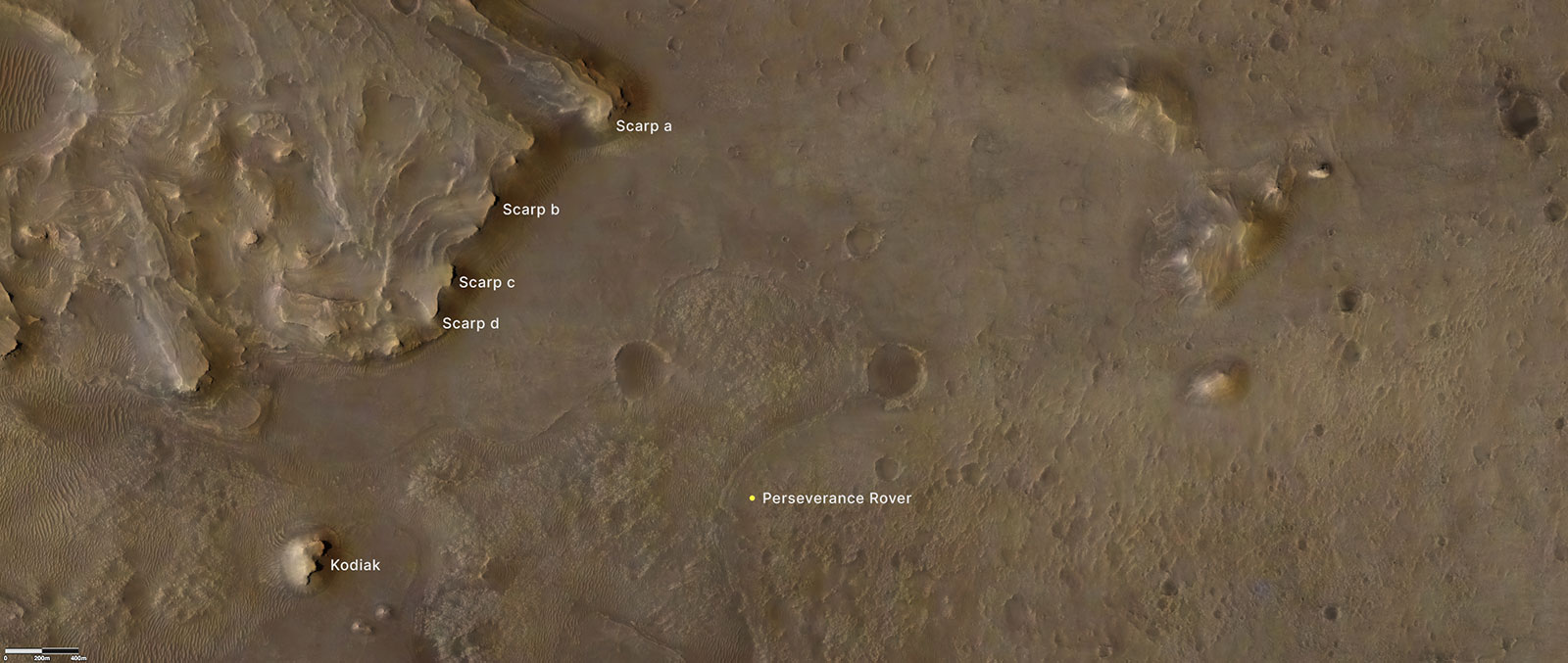 This annotated image indicates the locations of NASA’s Perseverance rover (lower right), as well as the “Kodiak” butte (lower left) and several prominent steep banks known as escarpments, or scarps, along the delta of Jezero Crater.