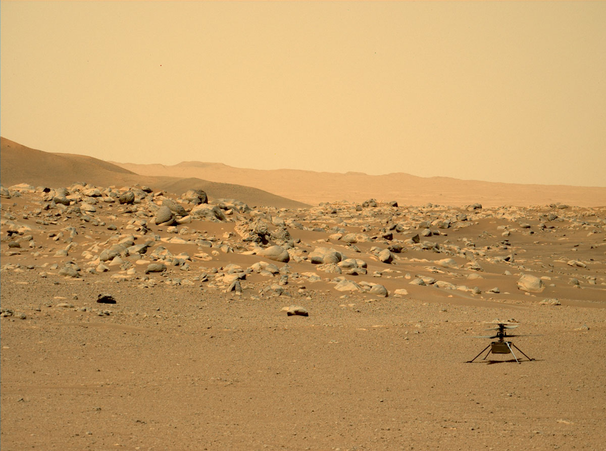 This image was taken by the Perseverance rover with the Mars Helicopter Ingenuity on the surface of Mars at the location, "Airfield D" (the fourth airfield), east of the "Séítah" geologic unit.