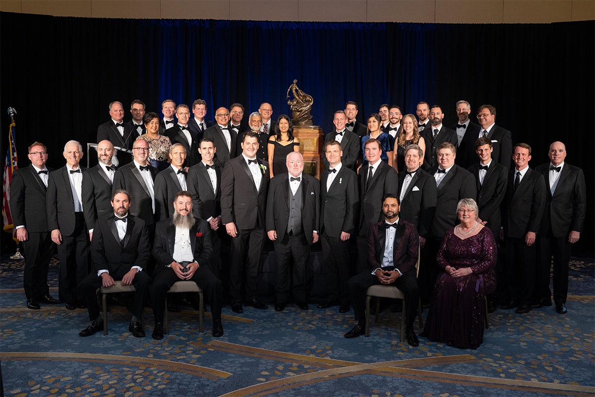 This image shows members of NASA's Ingenuity Mars Helicopter team with the Collier Trophy at the Robert J. Collier Dinner in Washington on June 9, 2022.
