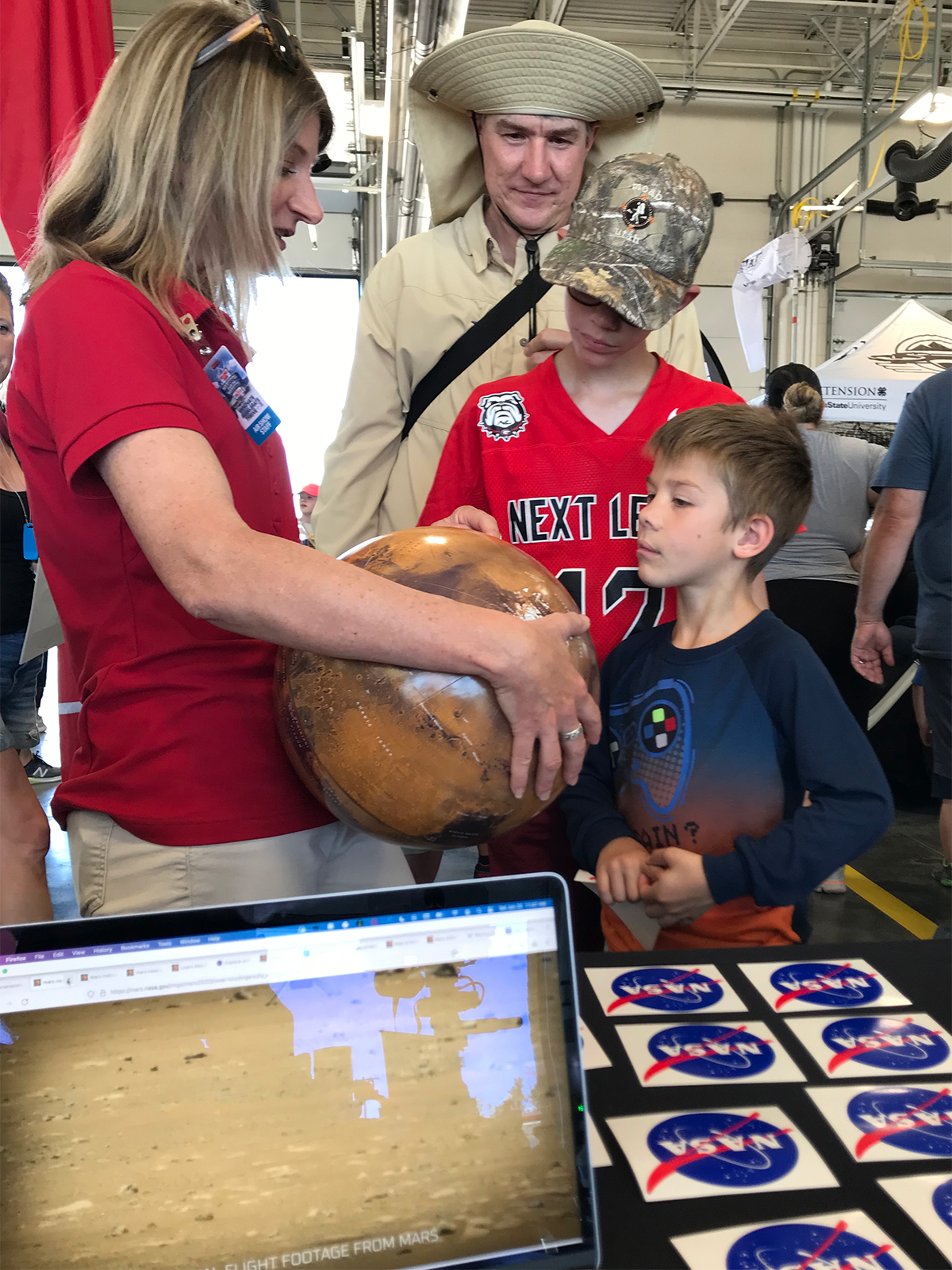Interested public, including adults and children, interacted with NASA Mars Exploration team members at the Utah Air Show, held at Hill Air Force Base June 25-26, 2022.