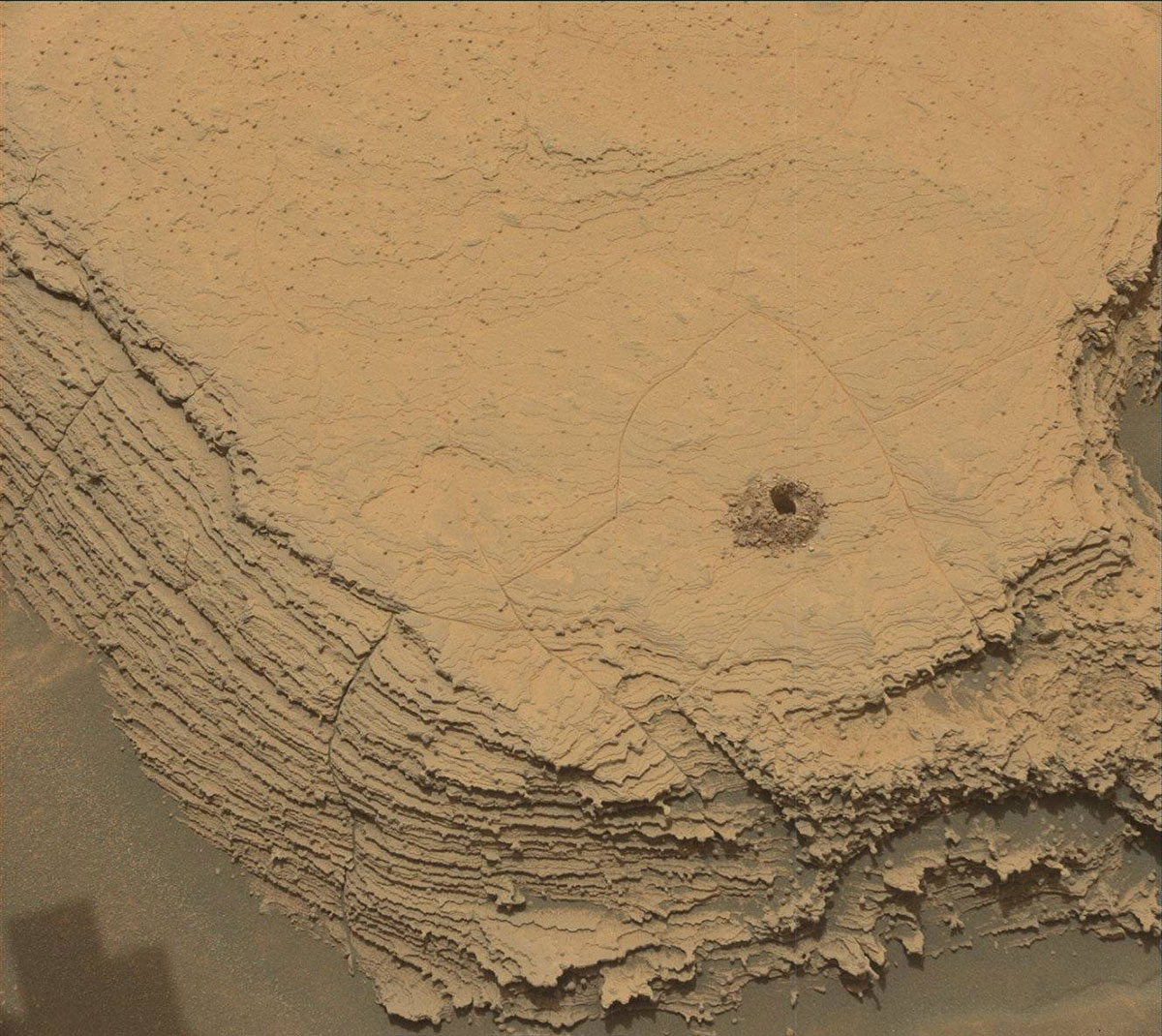 Curiosity used its Mast Camera, or Mastcam, to capture this image of its 36th successful drill hole on Mount Sharp, at a rock called “Canaima.” The rovers Mars Hand Lens Imager took the inset image.