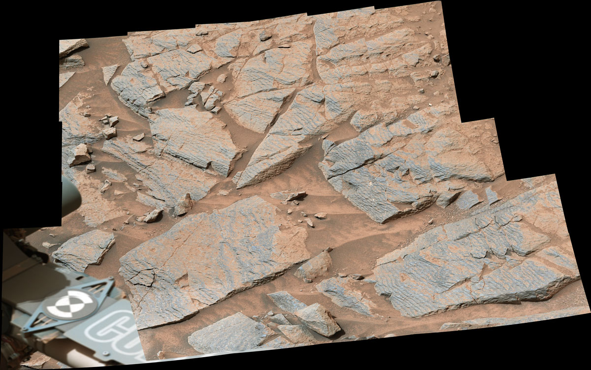 NASA’s Curiosity rover captured this image of rhythmic rock layers with a repetitive pattern in their spacing and thickness.