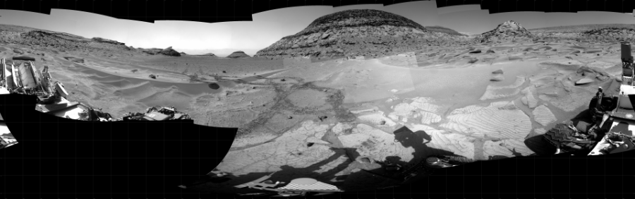 NASA's Mars rover Curiosity took 37 images in Gale Crater using its mast-mounted Right Navigation Camera (Navcam) to create this mosaic. The seam-corrected mosaic provides a 360-degree cylindrical projection panorama of the Martian surface centered at 57 degrees azimuth (measured clockwise from north). Curiosity took the images on February 25, 2023, Sols 3752-3749 of the Mars Science Laboratory mission at drive 1084, site number 100. The local mean solar time for the image exposures was 3 PM. Each Navcam image has a 45 degree field of view. CREDIT: NASA/JPL-Caltech