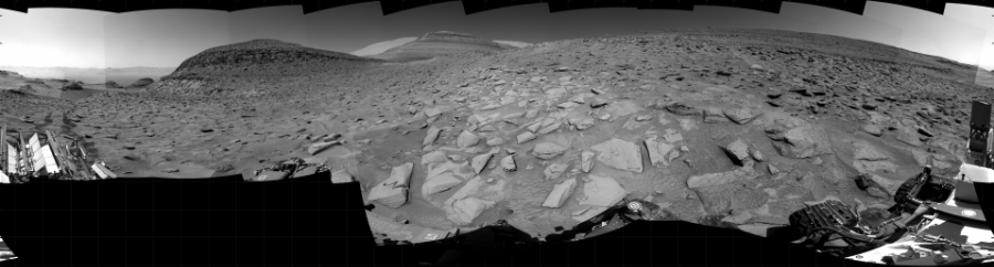 NASA's Mars rover Curiosity took 35 images in Gale Crater using its mast-mounted Right Navigation Camera (Navcam) to create this mosaic. The seam-corrected mosaic provides a 360-degree cylindrical projection panorama of the Martian surface centered at 134 degrees azimuth (measured clockwise from north). Curiosity took the images on May 03, 2023, Sols 3817-3815 of the Mars Science Laboratory mission at drive 774, site number 101. The local mean solar time for the image exposures was from 2 PM to 12 PM. Each Navcam image has a 45 degree field of view. CREDIT: NASA/JPL-Caltech