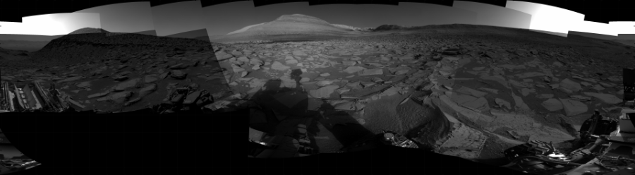 NASA's Mars rover Curiosity took 31 images in Gale Crater using its mast-mounted Right Navigation Camera (Navcam) to create this mosaic. The seam-corrected mosaic provides a 360-degree cylindrical projection panorama of the Martian surface centered at 129 degrees azimuth (measured clockwise from north). Curiosity took the images on June 29, 2023, Sols 3872-3871 of the Mars Science Laboratory mission at drive 390, site number 102. The local mean solar time for the image exposures was from 1 PM to 5 PM. Each Navcam image has a 45 degree field of view. CREDIT: NASA/JPL-Caltech