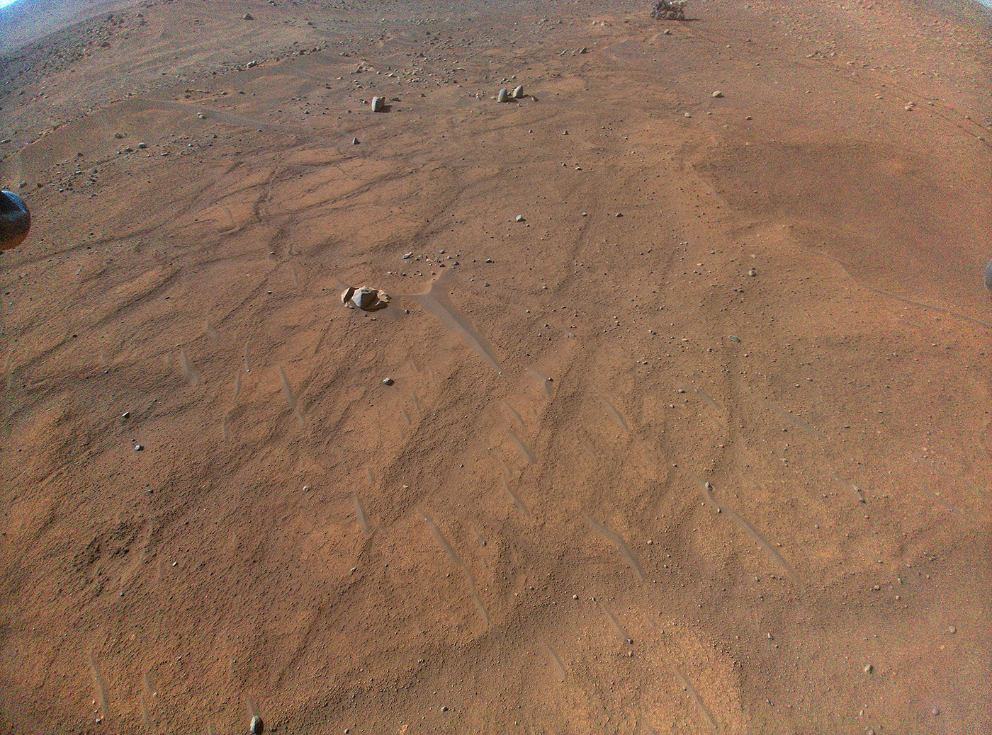 This image of NASA’s Perseverance Mars rover was taken by the Ingenuity Mars Helicopter during its 54th flight on August 3, 2023.