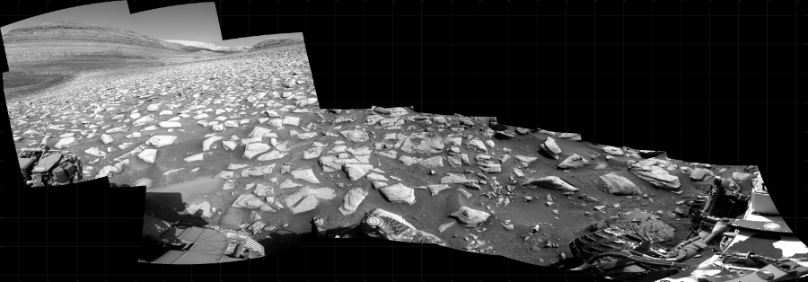 NASA's Mars rover Curiosity took 11 images in Gale Crater using its mast-mounted Right Navigation Camera (Navcam) to create this mosaic. The seam-corrected mosaic provides a 281-degree cylindrical projection panorama of the Martian surface centered at 214 degrees azimuth (measured clockwise from north). Curiosity took the images on September 06, 2023, Sol 3940 of the Mars Science Laboratory mission at drive 2898, site number 103. The local mean solar time for the image exposures was 2 PM. Each Navcam image has a 45 degree field of view. CREDIT: NASA/JPL-Caltech