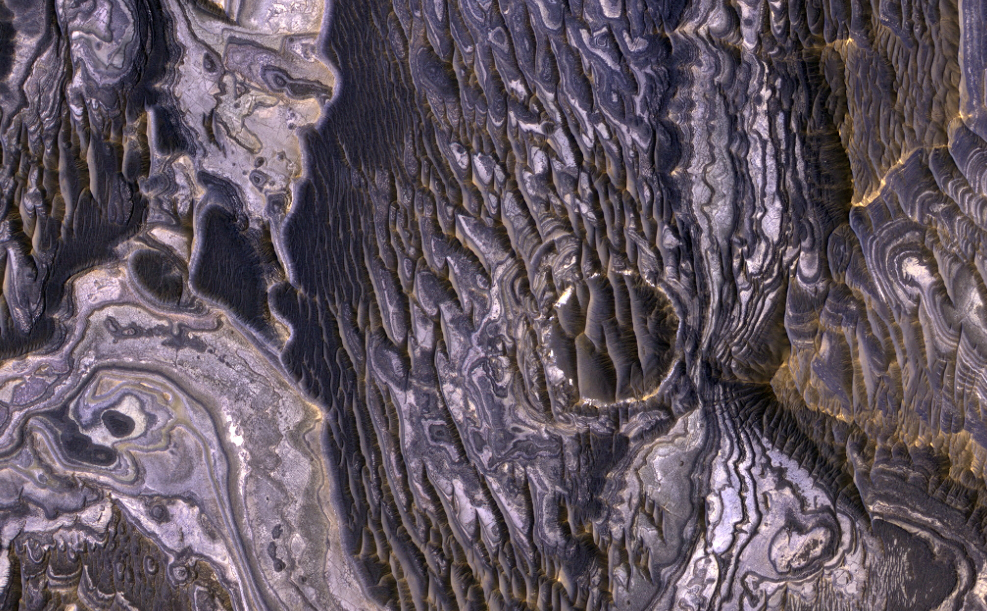 bright layered deposits on a plateau near Juventae Chasma in the Valles Marineris region of Mars