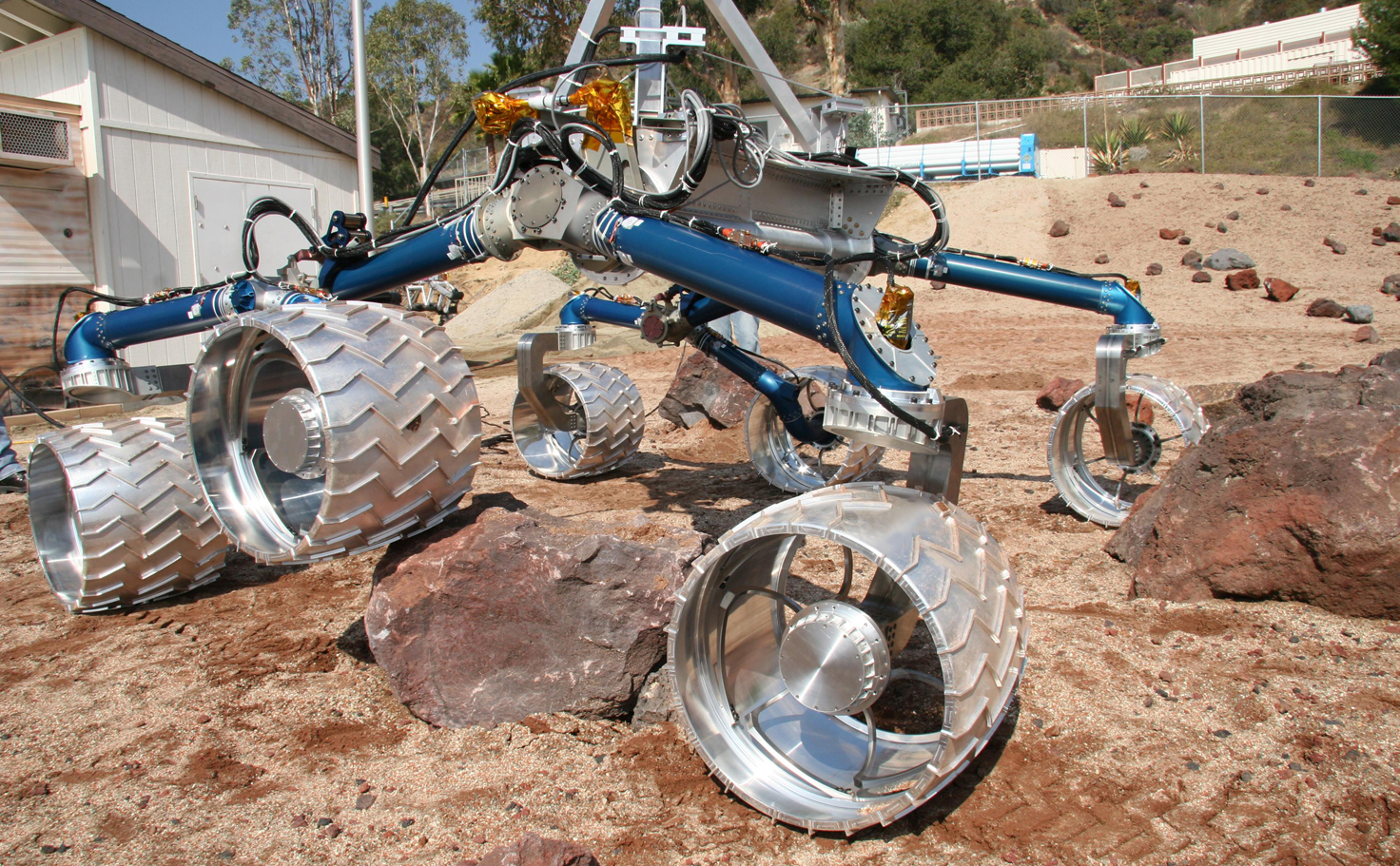 Scarecrow, a mobility-testing model for NASA's Mars Science Laboratory, easily traverses large rocks in the Mars Yard testing area at NASA's Jet Propulsion Laboratory.