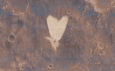 This picture of a heart-shaped feature in Arabia Terra on Mars was taken on May 23, 2010, by the Context Camera (CTX) on NASA's Mars Reconnaissance Orbiter.