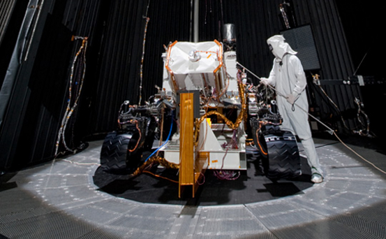 This image shows preparation for March 2011 testing of the Mars Science Laboratory rover, Curiosity, in a 25-foot-diameter (7.6-meter-diameter) space-simulation chamber. The testing was designed to put the rover through operational sequences in environmental conditions similar to what it will experience on the surface of Mars.
