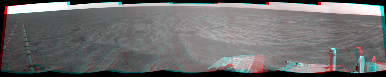 A dance-step pattern is visible in the wheel tracks near the left edge of this scene recorded in stereo by the navigation camera on NASA's Mars Exploration Rover Opportunity during the 2,554th Martian day, or sol, of the rover's work on Mars (April 1, 2011).