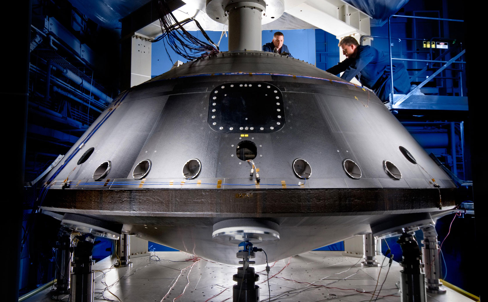 This image from July 2008 shows the aeroshell for NASA's Mars Science Laboratory while it was being worked on by spacecraft technicians at Lockheed Martin Space Systems Company near Denver.