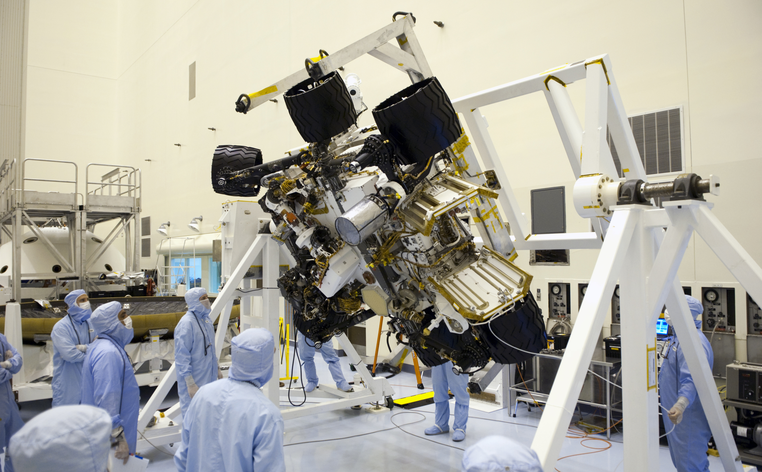 Technicians in the Payload Hazardous Servicing Facility at NASA's Kennedy Space Center in Florida put NASA's Mars Science Laboratory (MSL) rover, known as Curiosity, through a series of rotation tests.