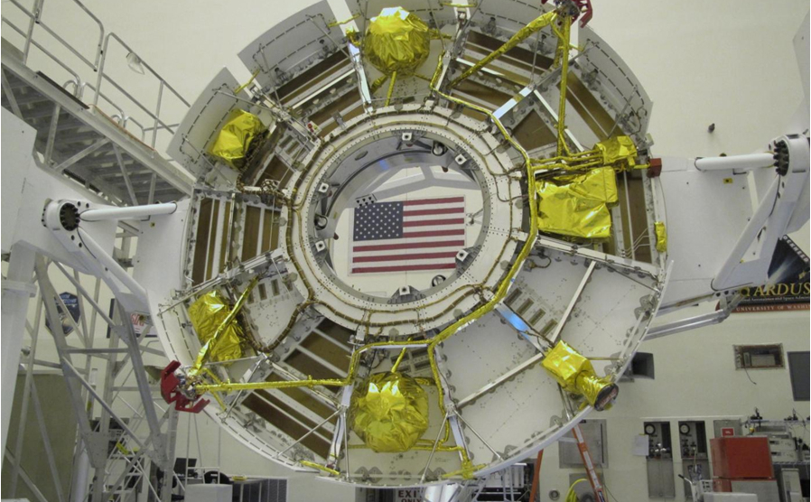The cruise stage of NASA's Mars Science Laboratory spacecraft is being prepared for final stacking of the spacecraft in this photograph from inside the Payload Hazardous Servicing Facility at NASA Kennedy Space Center, Fla.