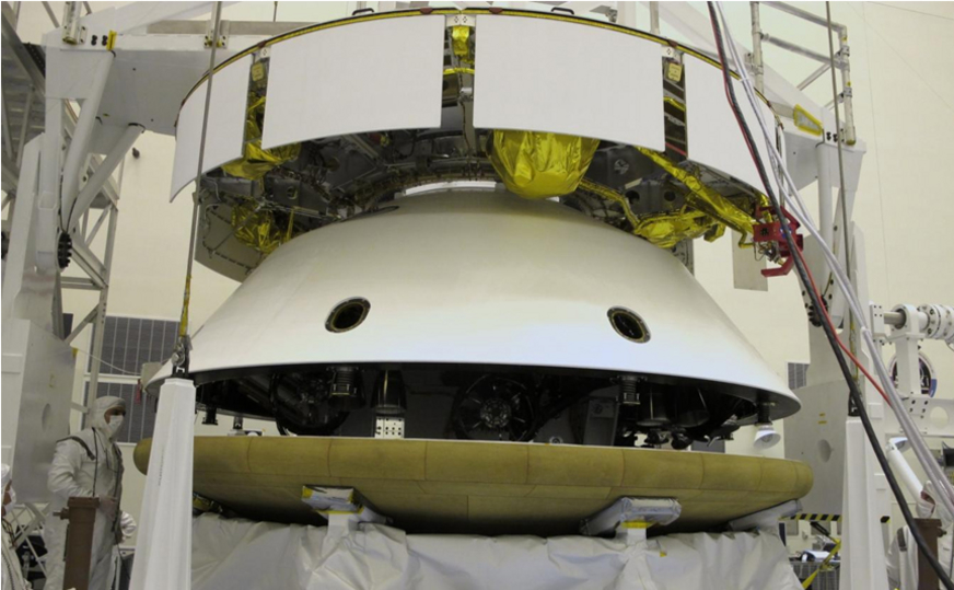During final stacking of NASA's Mars Science Laboratory spacecraft, the heat shield is positioned for integration with the rest of the spacecraft in this photograph from inside the Payload Hazardous Servicing Facility at NASA Kennedy Space Center, Fla.
