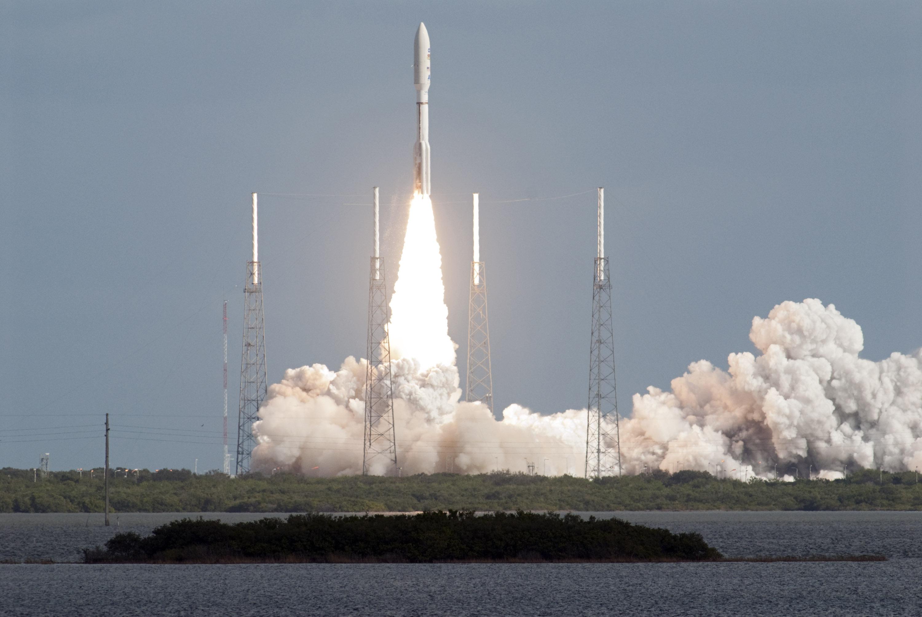 NASA's Mars Science Laboratory spacecraft, sealed inside its payload fairing atop the United Launch Alliance Atlas V rocket, clears the tower at Space Launch Complex 41 on Cape Canaveral Air Force Station in Florida.The mission lifted off at 10:02 a.m. EST (7:02 a.m. PST), Nov. 26, beginning an eight-month interplanetary cruise to Mars. The spacecraft's components include a car-sized rover, Curiosity, which has 10 science instruments designed to search for signs of life, including methane, and to help determine if this gas is from a biological or geological source.