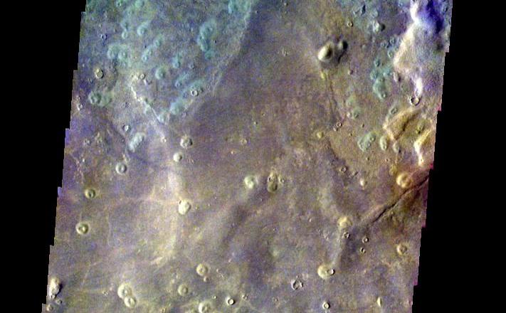 This image of a crater in Acidalia Planitia was acquired March 8, 2003, during northern summer.